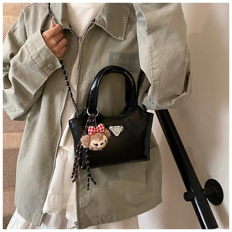 Women's Silver Chain Shoulder Bag with Cute Doll Design — feature 16