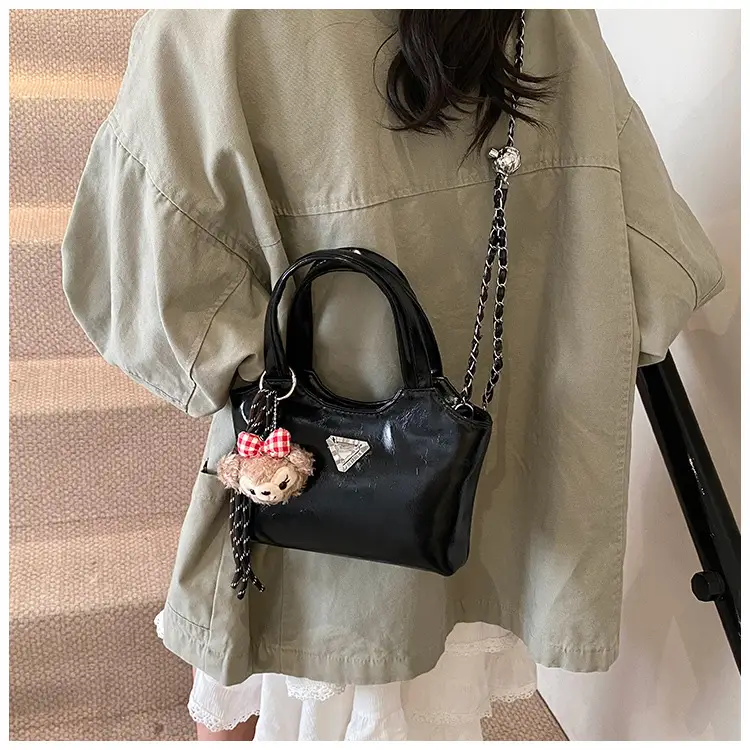 Women's Silver Chain Shoulder Bag with Cute Doll Design — feature 17