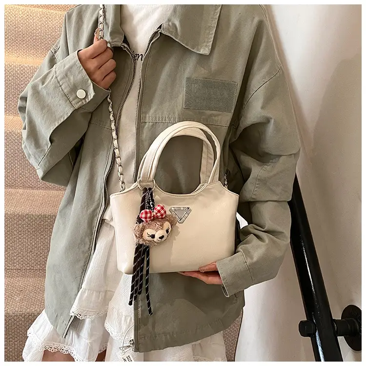 Women's Silver Chain Shoulder Bag with Cute Doll Design — feature 18