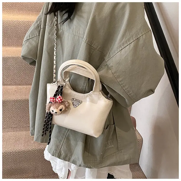 Women's Silver Chain Shoulder Bag with Cute Doll Design — feature 19