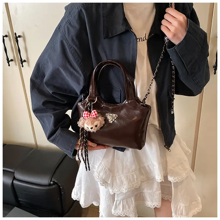 Women's Silver Chain Shoulder Bag with Cute Doll Design — feature 21