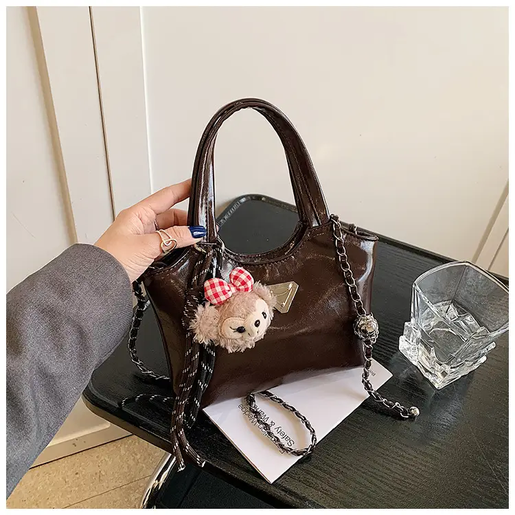 Women's Silver Chain Shoulder Bag with Cute Doll Design — feature 25