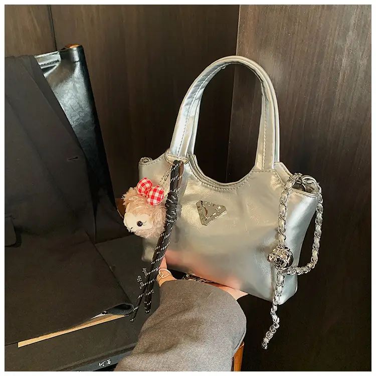 Women's Silver Chain Shoulder Bag with Cute Doll Design — feature 26