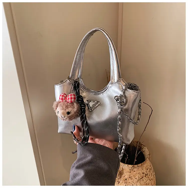 Women's Silver Chain Shoulder Bag with Cute Doll Design — feature 27