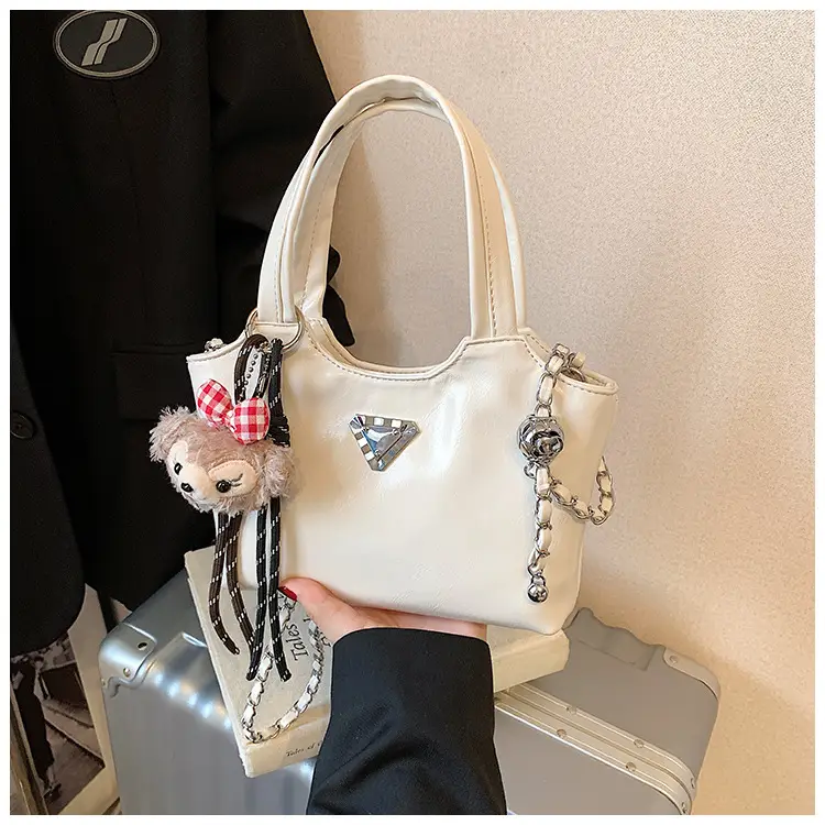 Women's Silver Chain Shoulder Bag with Cute Doll Design — feature 28