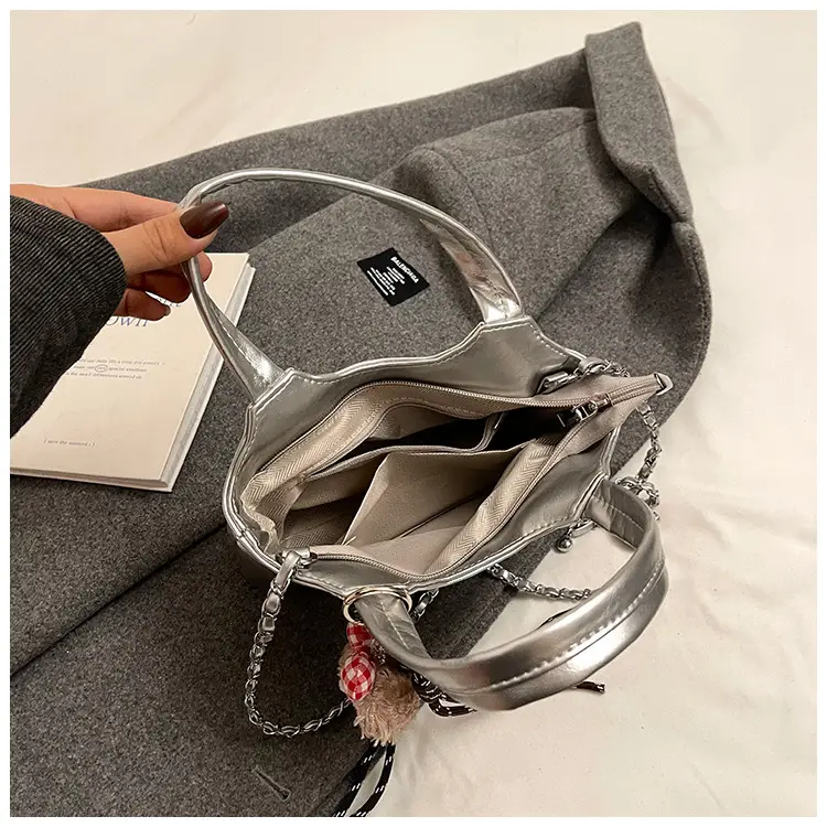 Women's Silver Chain Shoulder Bag with Cute Doll Design — feature 5