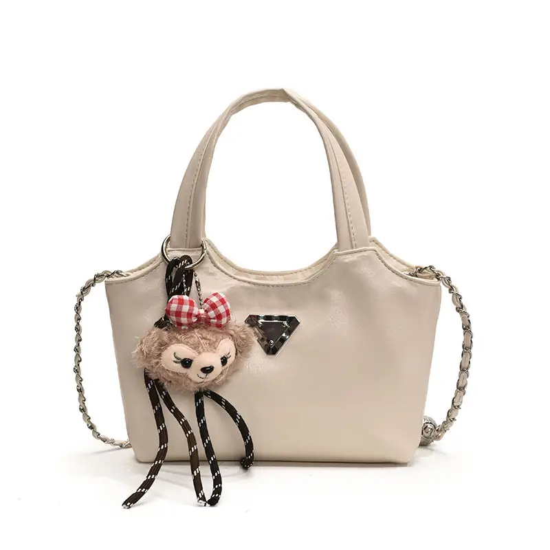 Women's Silver Chain Shoulder Bag with Cute Doll Design - Image 3