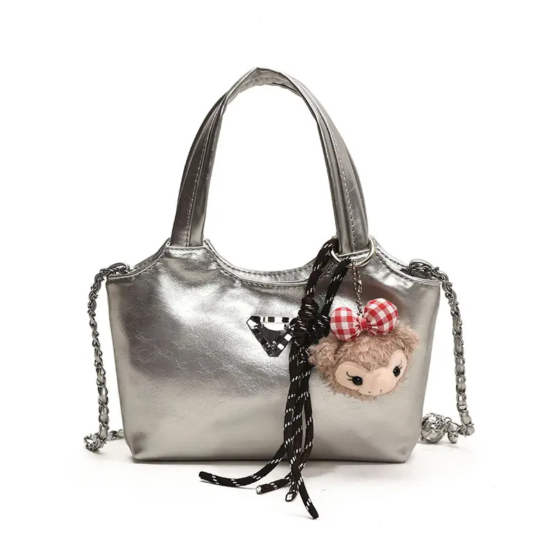 Women's Silver Chain Shoulder Bag with Cute Doll Design - Image 4