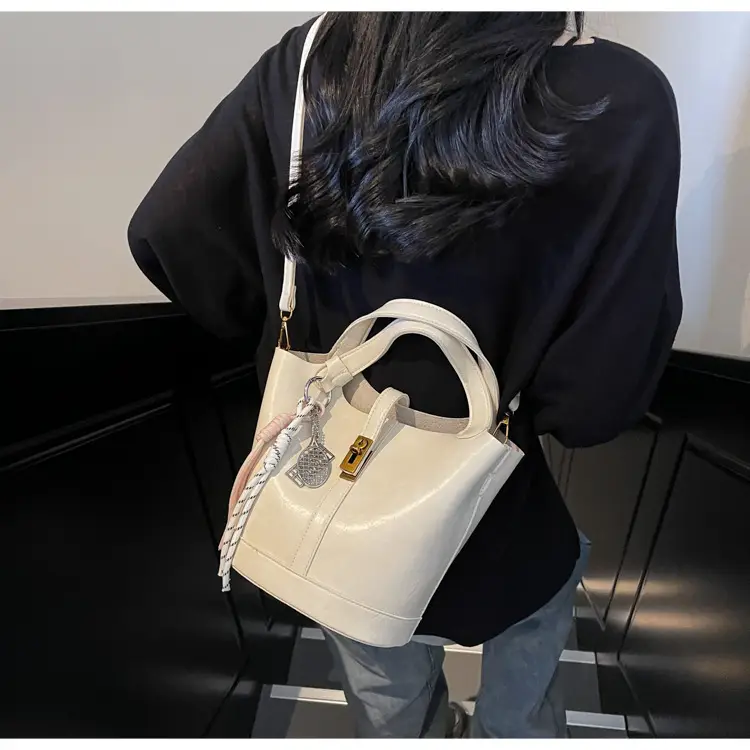 Women's 2025 Retro Bucket Bag Beige Leather — feature 40