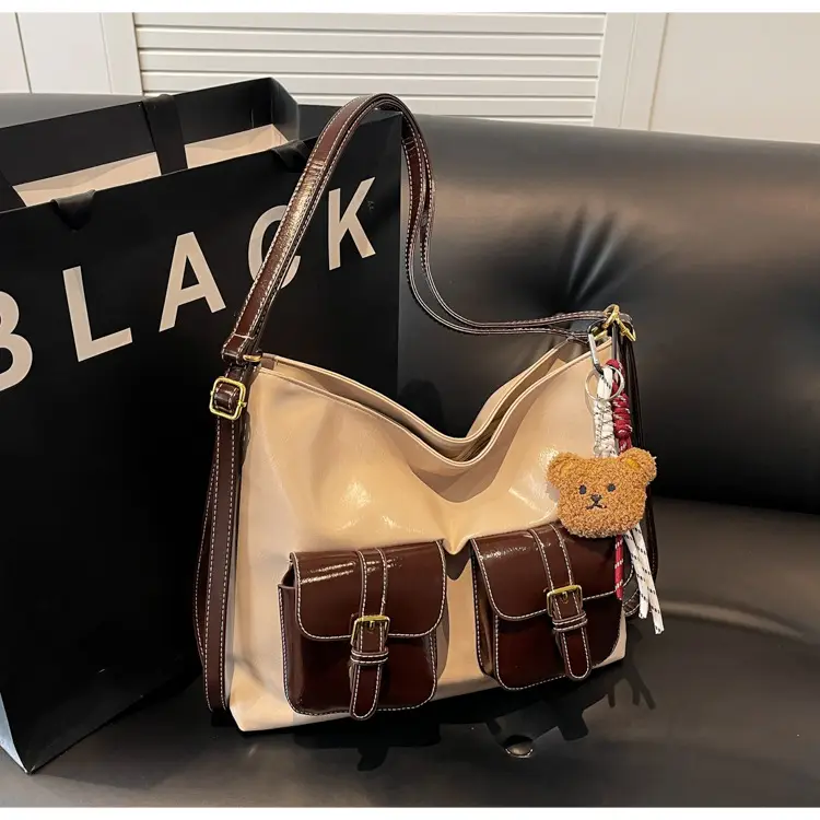 Black Leather Crossbody Bag with Gold Clasp & Teddy Keychain — feature 14