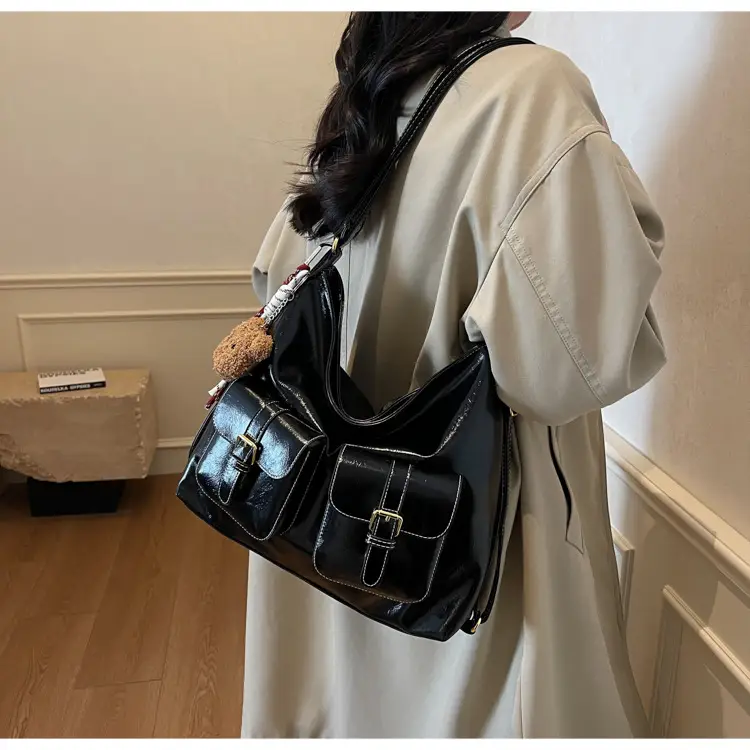 Black Leather Crossbody Bag with Gold Clasp & Teddy Keychain — feature 16