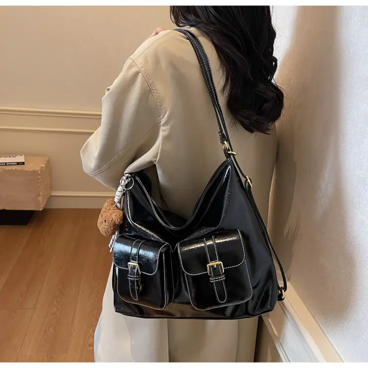 Black Leather Crossbody Bag with Gold Clasp & Teddy Keychain — feature 17
