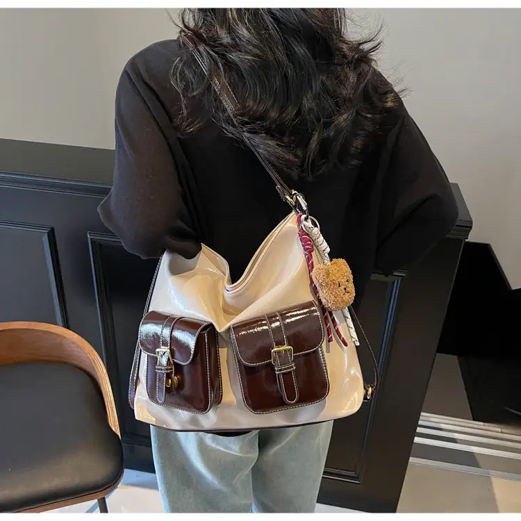 Black Leather Crossbody Bag with Gold Clasp & Teddy Keychain — feature 20