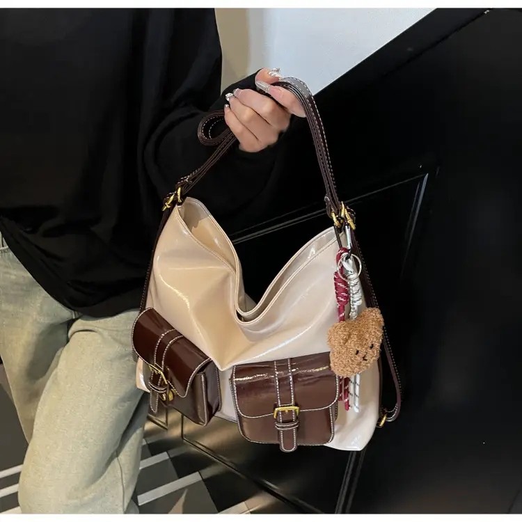Black Leather Crossbody Bag with Gold Clasp & Teddy Keychain — feature 22