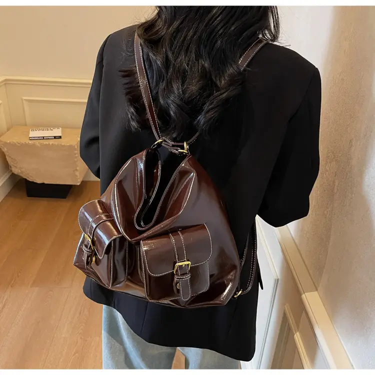 Black Leather Crossbody Bag with Gold Clasp & Teddy Keychain — feature 27