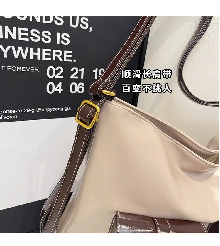 Black Leather Crossbody Bag with Gold Clasp & Teddy Keychain — feature 3