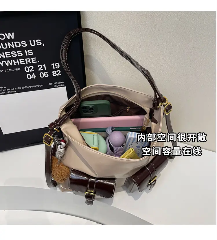 Black Leather Crossbody Bag with Gold Clasp & Teddy Keychain — feature 8