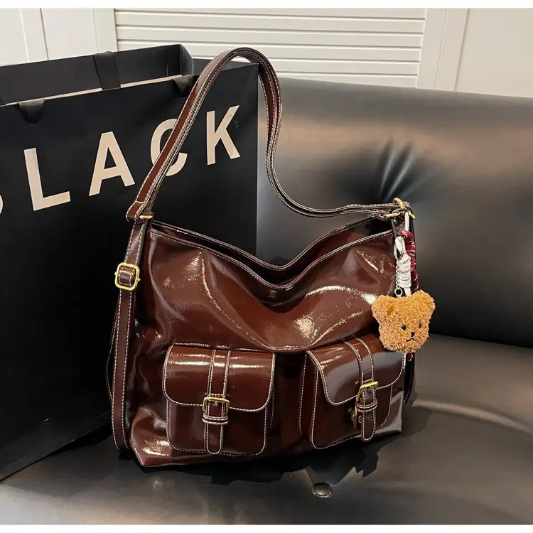 Black Leather Crossbody Bag with Gold Clasp & Teddy Keychain - Image 3