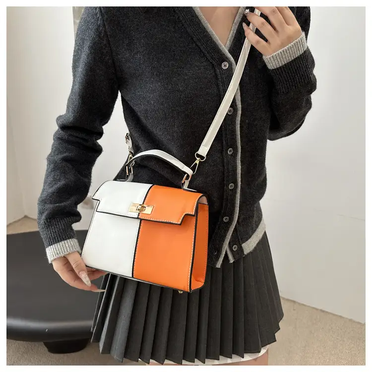 Black Leather Shoulder Bag with Gold Clasp 2025 — feature 11
