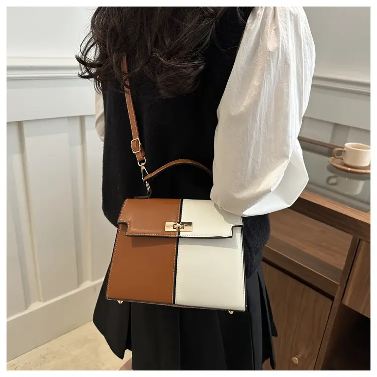 Black Leather Shoulder Bag with Gold Clasp 2025 — feature 14