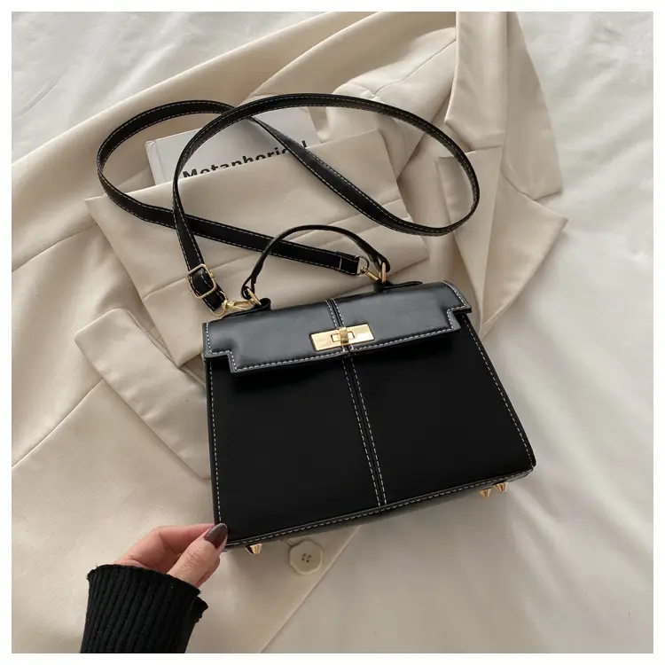 Black Leather Shoulder Bag with Gold Clasp 2025 — feature 21