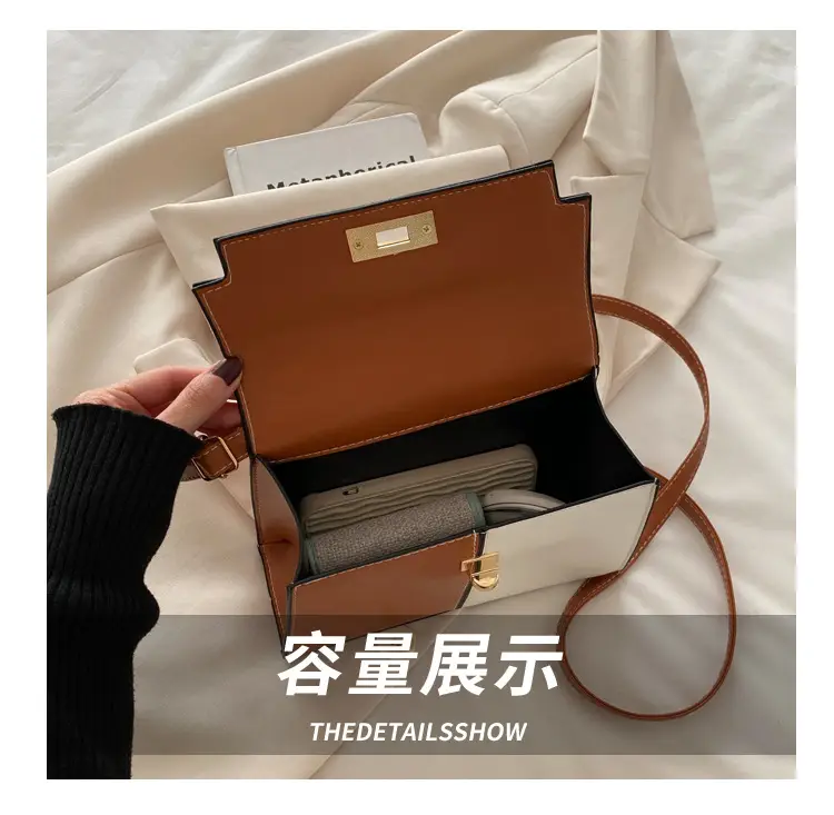 Black Leather Shoulder Bag with Gold Clasp 2025 — feature 6