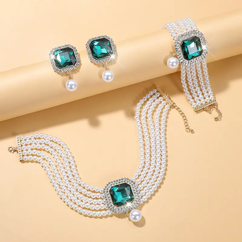 Three-piece Bridal Jewelry Set with Emerald Cufflures and Pearl Accents - Image 15