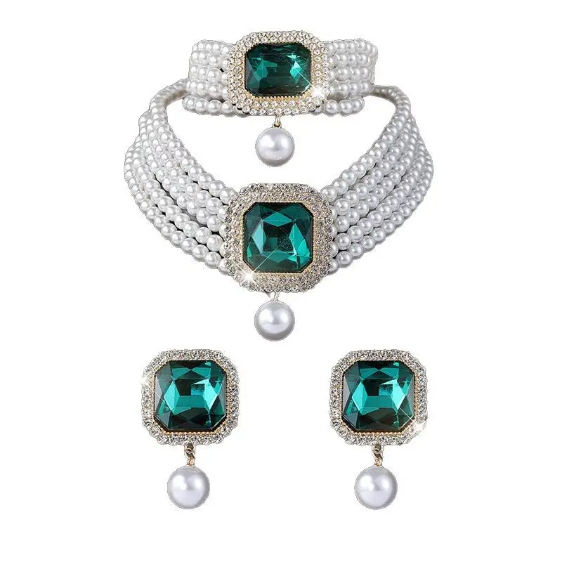 Three-piece Bridal Jewelry Set with Emerald Cufflures and Pearl Accents - Image 17