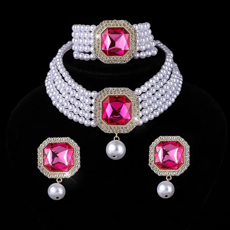 Three-piece Bridal Jewelry Set with Emerald Cufflures and Pearl Accents - Image 11