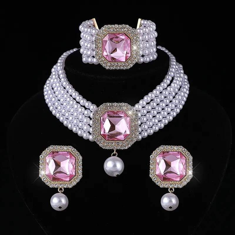 Three-piece Bridal Jewelry Set with Emerald Cufflures and Pearl Accents - Image 12
