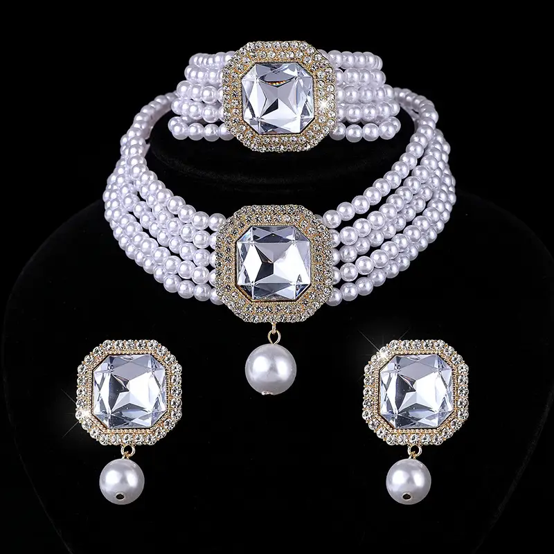 Three-piece Bridal Jewelry Set with Emerald Cufflures and Pearl Accents - Image 5