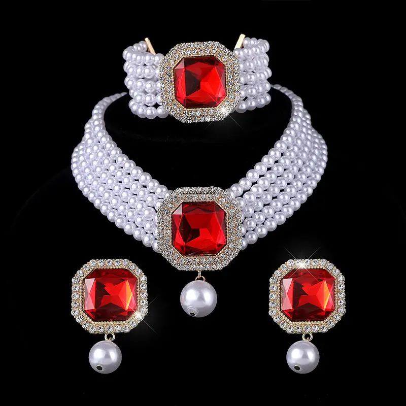 Three-piece Bridal Jewelry Set with Emerald Cufflures and Pearl Accents - Image 6