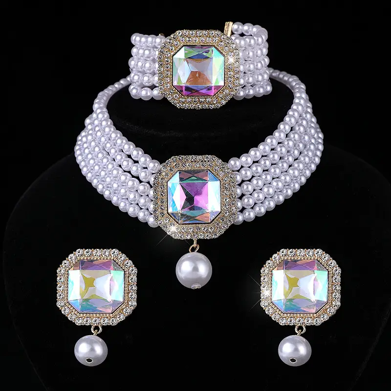 Three-piece Bridal Jewelry Set with Emerald Cufflures and Pearl Accents - Image 9