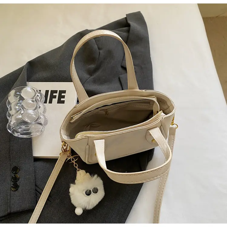 Women's Black Nylon Bucket Bag with Cute Pom Pom Charm — feature 10