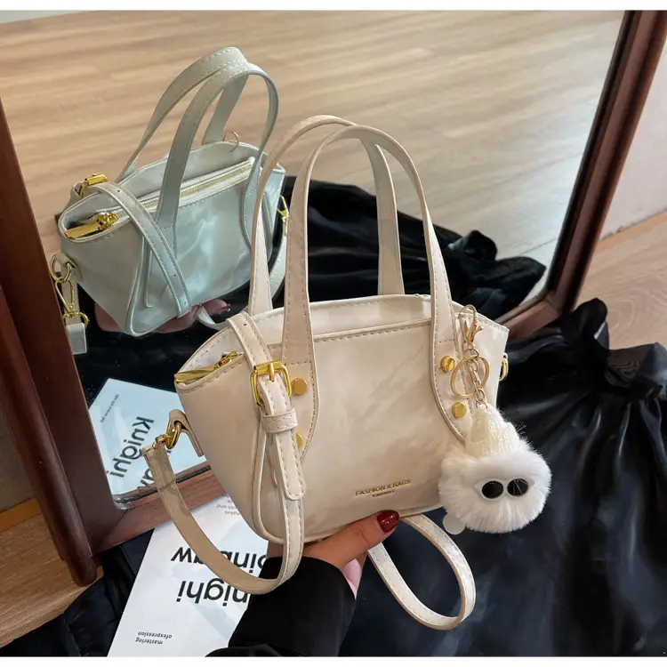 Women's Black Nylon Bucket Bag with Cute Pom Pom Charm — feature 18