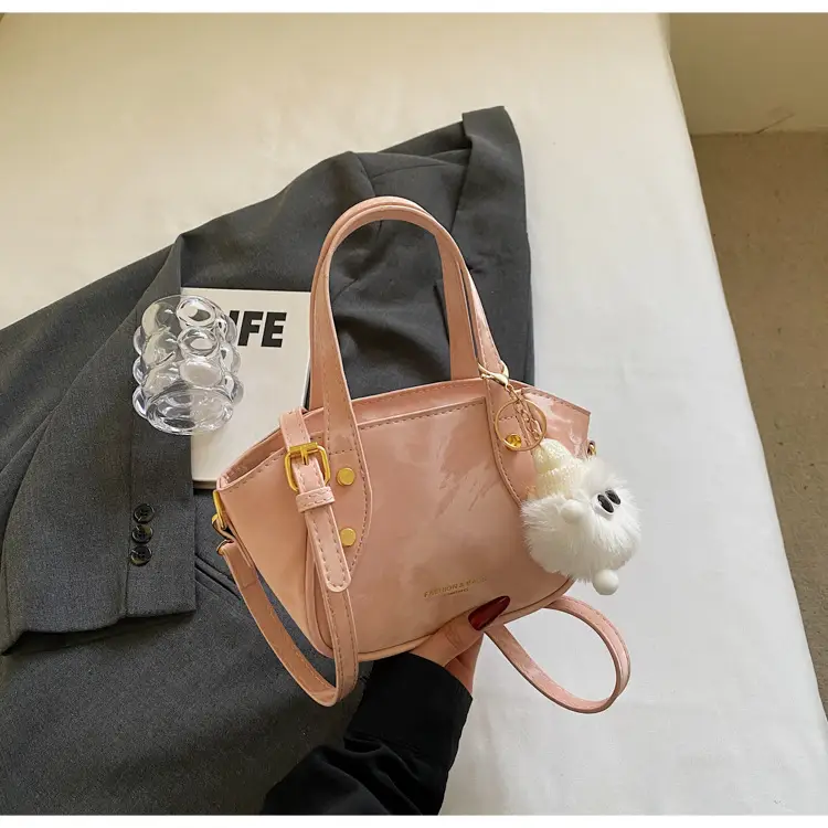 Women's Black Nylon Bucket Bag with Cute Pom Pom Charm — feature 23