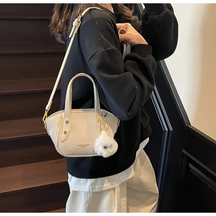 Women's Black Nylon Bucket Bag with Cute Pom Pom Charm — feature 25