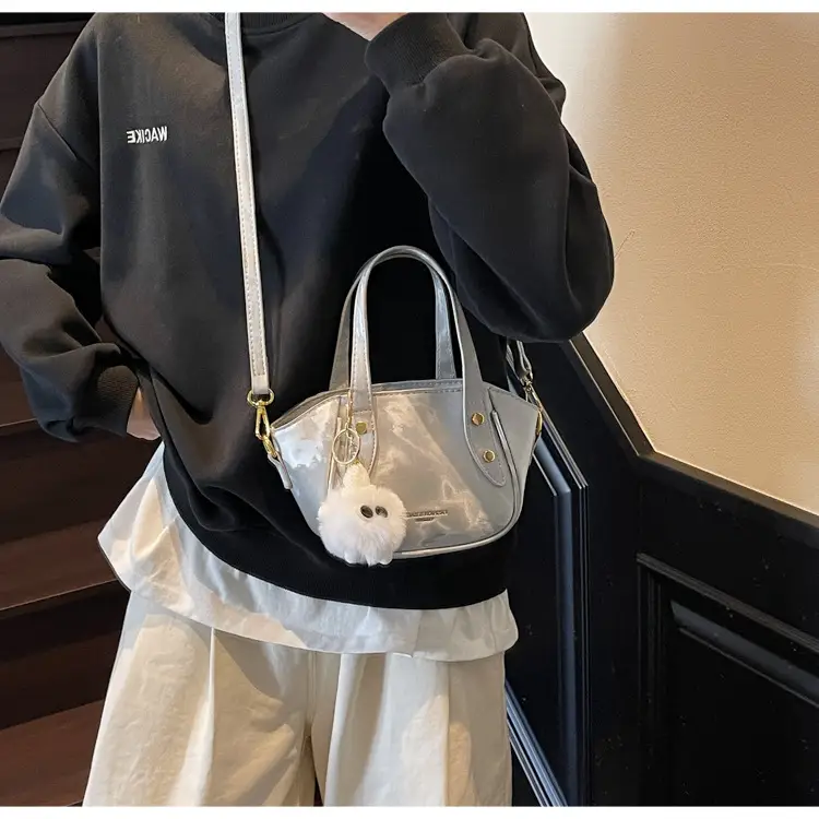 Women's Black Nylon Bucket Bag with Cute Pom Pom Charm — feature 27