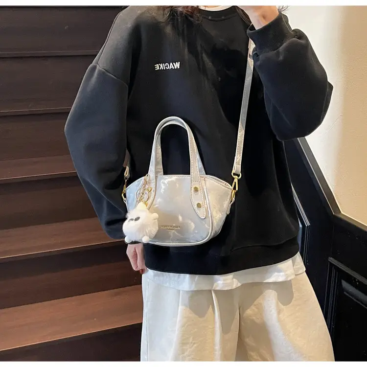 Women's Black Nylon Bucket Bag with Cute Pom Pom Charm — feature 28