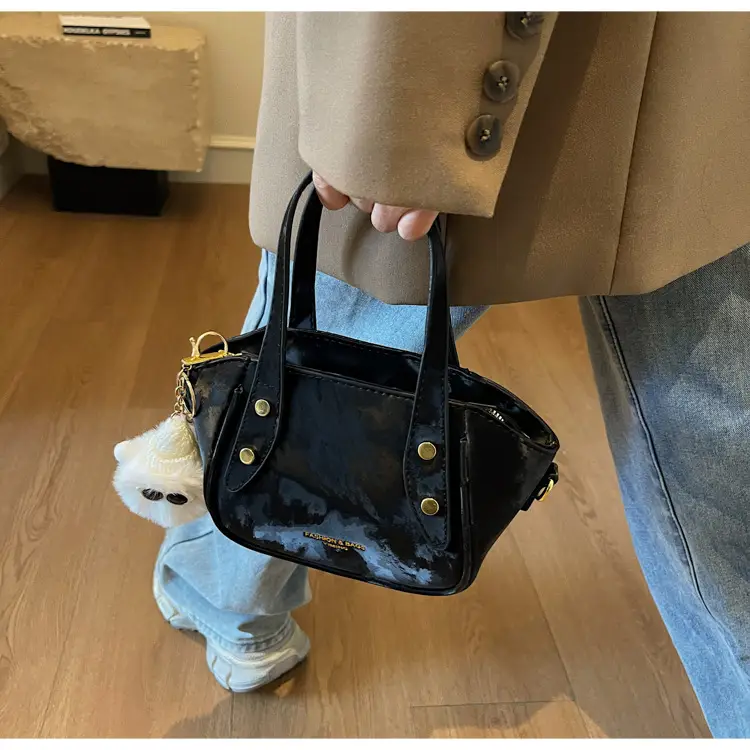 Women's Black Nylon Bucket Bag with Cute Pom Pom Charm — feature 31