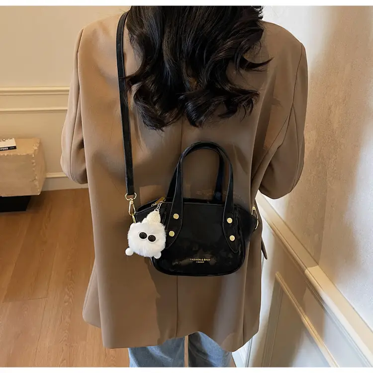 Women's Black Nylon Bucket Bag with Cute Pom Pom Charm — feature 32