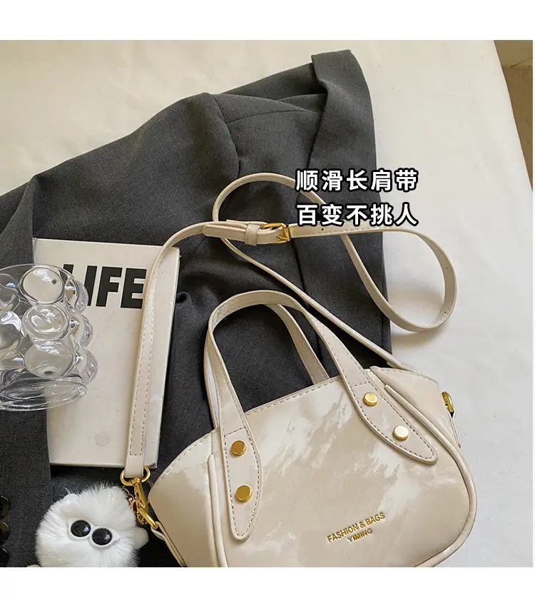 Women's Black Nylon Bucket Bag with Cute Pom Pom Charm — feature 4