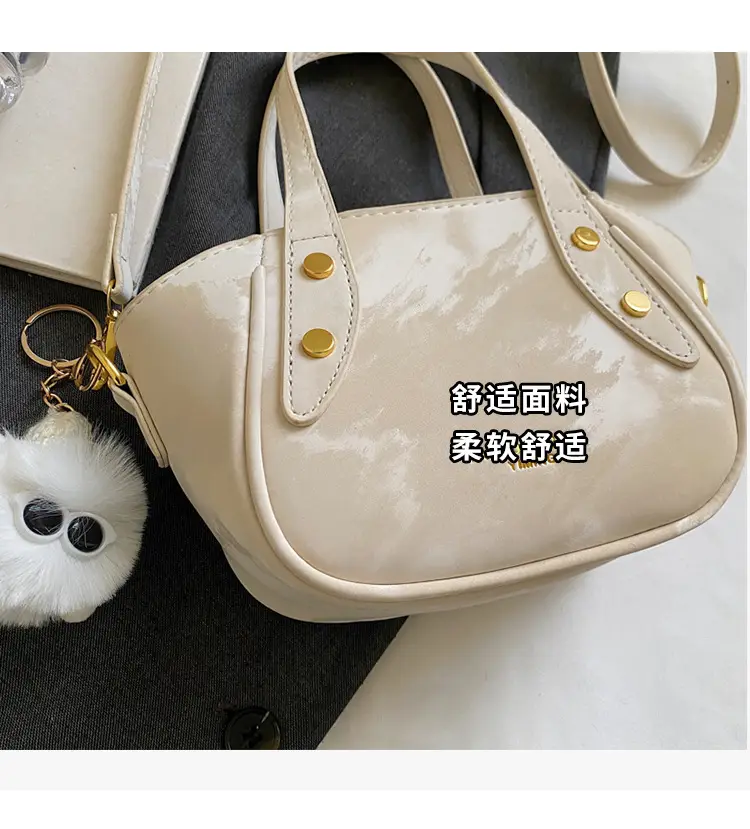 Women's Black Nylon Bucket Bag with Cute Pom Pom Charm — feature 7