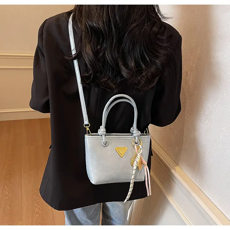 Women's Light Blue Retro Handbag with Gold Plated Logo — feature 17