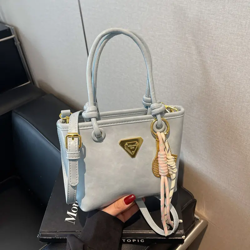 Women's Light Blue Retro Handbag with Gold Plated Logo - Image 3