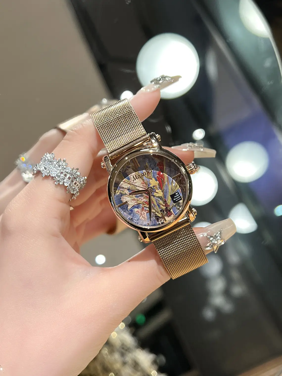 Women's Artistic Feather Watch with Gold Mesh Band — feature 7