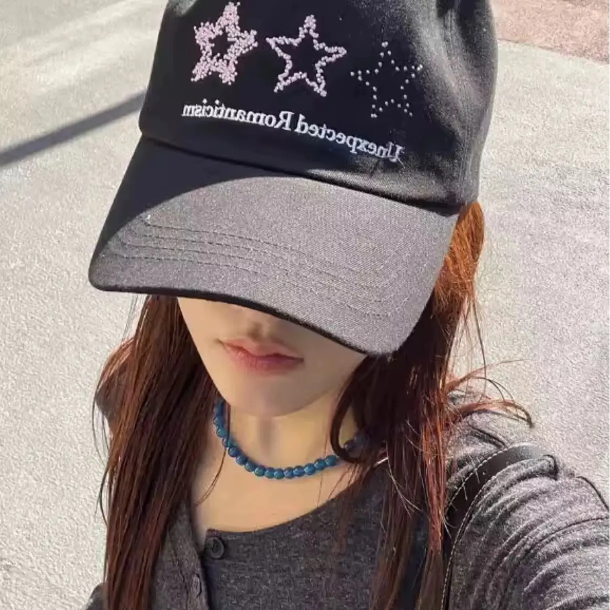 Black Star Embroidered Baseball Cap with "Unexpected Romainis" Design - Image 4