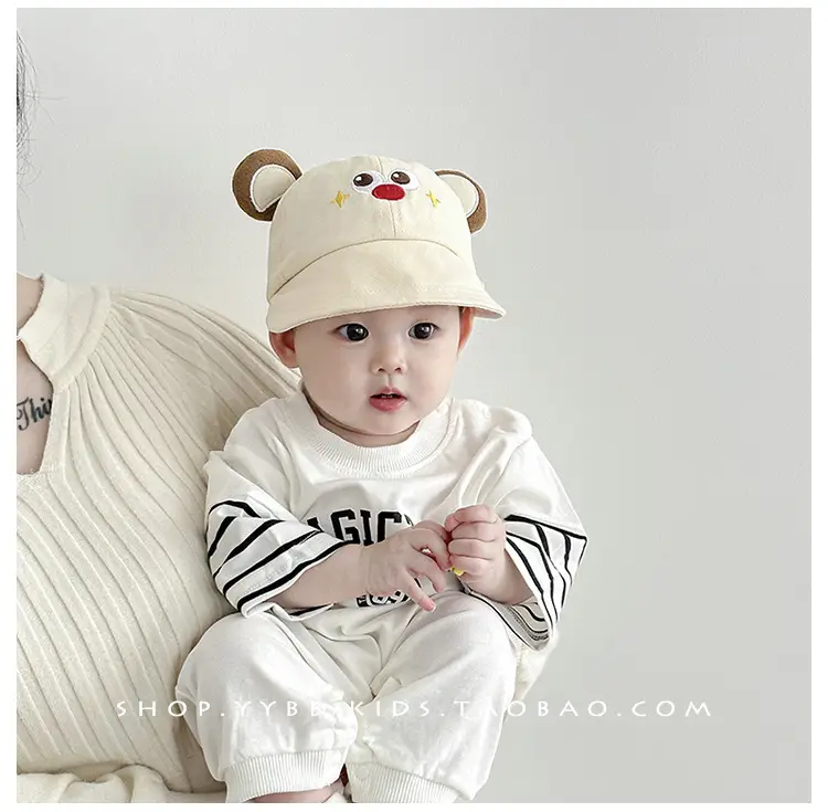 Baby's Beanie Hat with Pom Pom Feet Brown Cream β feature 2