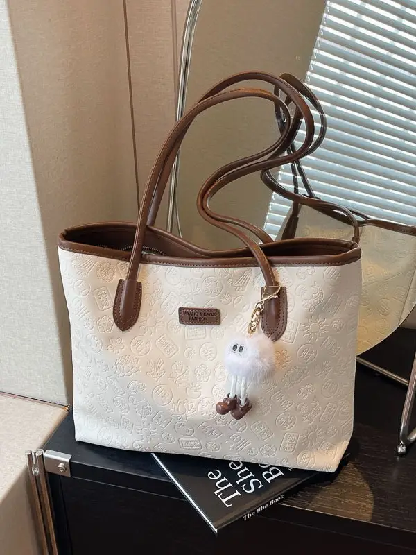 Women's White Embossed Shoulder Bag with Pink Handle & Doll Key