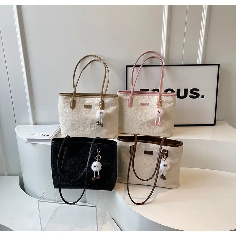 Women's White Embossed Shoulder Bag with Pink Handle & Doll Key — feature 1